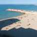 Ammiriamo la spiaggia dallalto usufruendo della generosit di una signora che ci fa salire sul terrazzo della propria casa che affaccia sullarenile